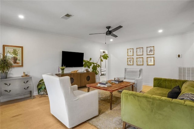 601 Andrews Ave, Metairie, LA 70005 - living room featuring recessed lighting, a ceiling fan, light wood-style flooring, baseboards, and ornamental molding