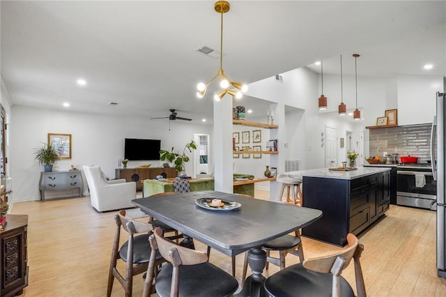 601 Andrews Ave, Metairie, LA 70005 - dining area featuring ceiling fan, light wood-style floors, and recessed lighting