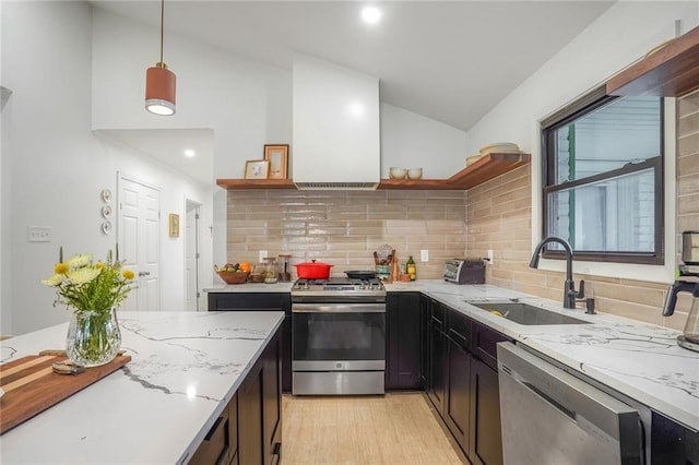 601 Andrews Ave, Metairie, LA 70005 - kitchen featuring stainless steel gas range oven, open shelves, a sink, dishwashing machine, and vaulted ceiling