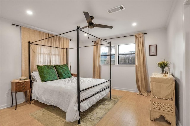 601 Andrews Ave, Metairie, LA 70005 - bedroom with light wood-style flooring, recessed lighting, ceiling fan, and baseboards