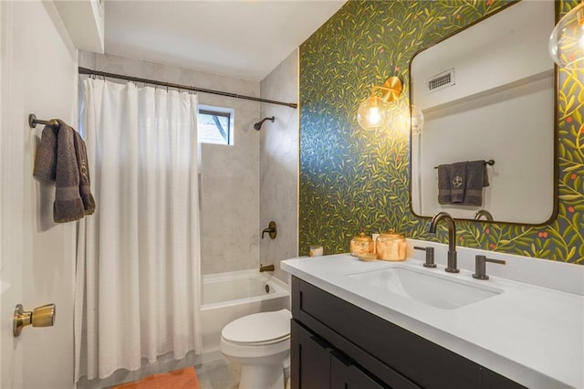 601 Andrews Ave, Metairie, LA 70005 - bathroom featuring wallpapered walls, vanity, toilet, and shower / bathtub combination with curtain