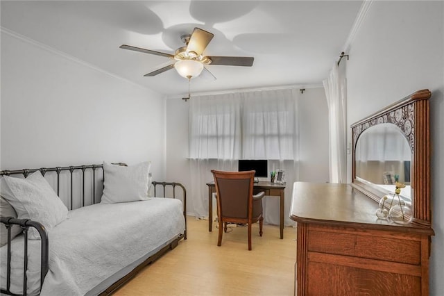 601 Andrews Ave, Metairie, LA 70005 - bedroom with light wood-style floors, ornamental molding, a desk, and ceiling fan