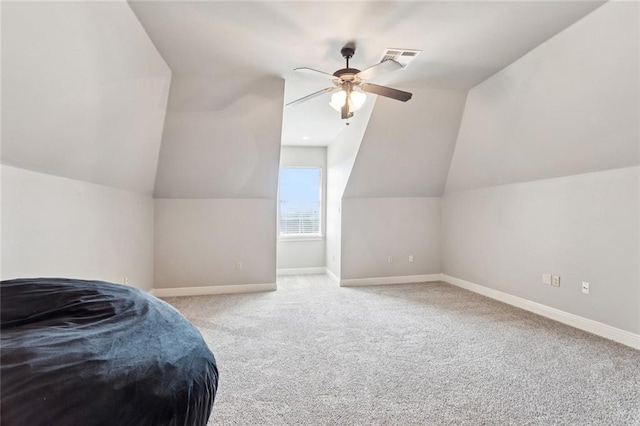 1037 Scarlet Oak Ln, Mandeville, LA 70448 - bonus room featuring carpet floors, ceiling fan, lofted ceiling, and baseboards