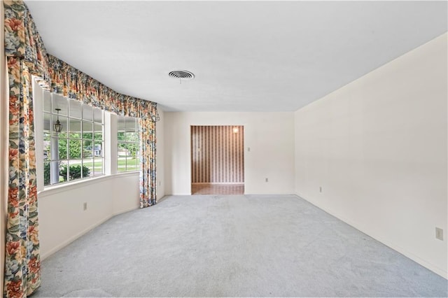 213 N Jayson Dr, Slidell, LA 70458 - carpeted empty room with baseboards