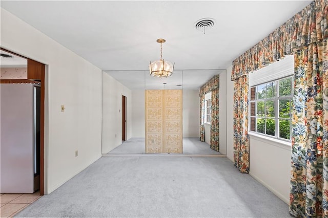213 N Jayson Dr, Slidell, LA 70458 - spare room featuring carpet flooring and baseboards