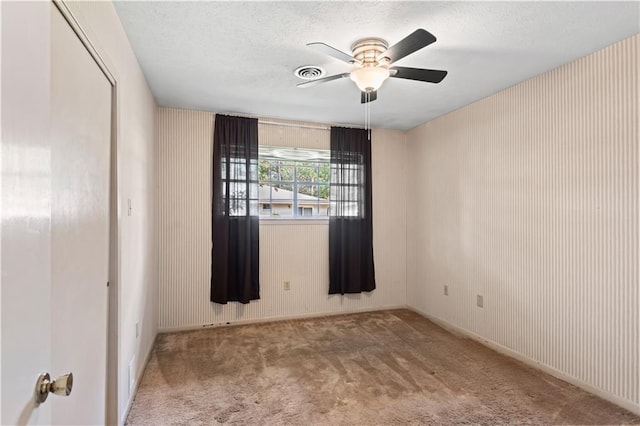 213 N Jayson Dr, Slidell, LA 70458 - unfurnished room featuring carpet flooring, ceiling fan, and a textured ceiling