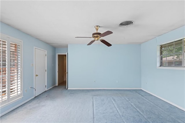 213 N Jayson Dr, Slidell, LA 70458 - unfurnished room featuring carpet flooring, a ceiling fan, and baseboards