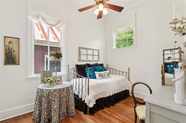 505 W 14th Ave, Covington, LA 70433 - bedroom featuring wood finished floors, baseboards, and crown molding