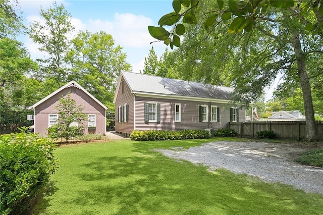 505 W 14th Ave, Covington, LA 70433 - rear view of property with metal roof