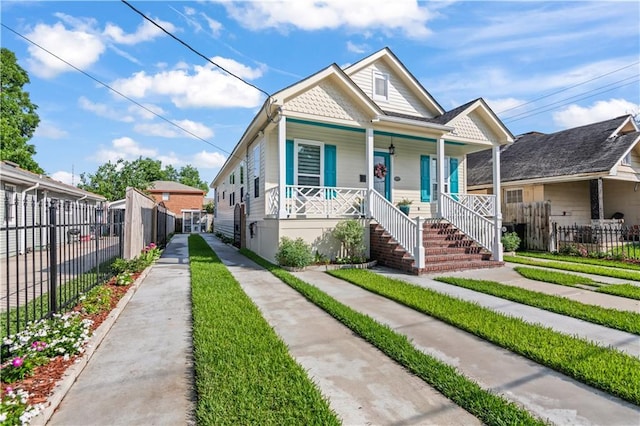 2828 Mistletoe St, New Orleans, LA 70118 - view of front of property with covered porch