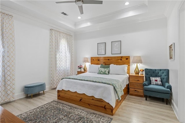 2828 Mistletoe St, New Orleans, LA 70118 - bedroom featuring a raised ceiling, crown molding, light wood-style floors, ceiling fan, and recessed lighting