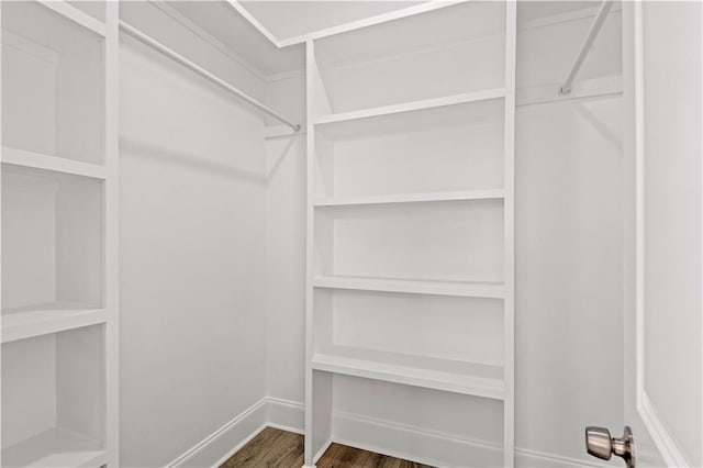 3414 Monroe St, New Orleans, LA 70118 - walk in closet featuring wood finished floors