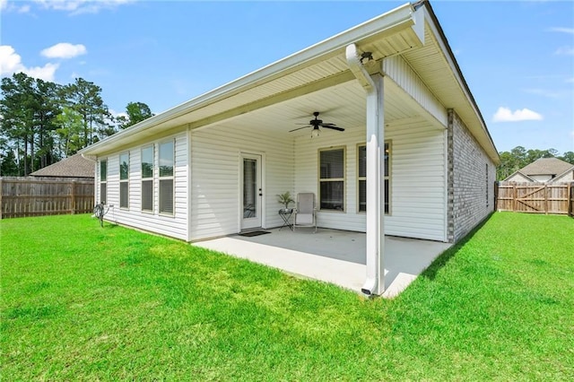 22039 Giselle Dr, Mandeville, LA 70471 - rear view of house featuring ceiling fan and a patio area
