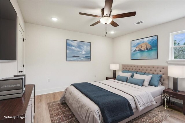 21507 Birtrue Rd, Bush, LA 70431 - bedroom with light wood-type flooring, recessed lighting, ceiling fan, and baseboards