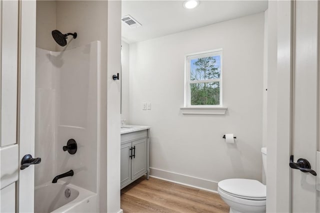 21507 Birtrue Rd, Bush, LA 70431 - full bath featuring vanity, toilet, shower / bath combination, baseboards, and wood finished floors