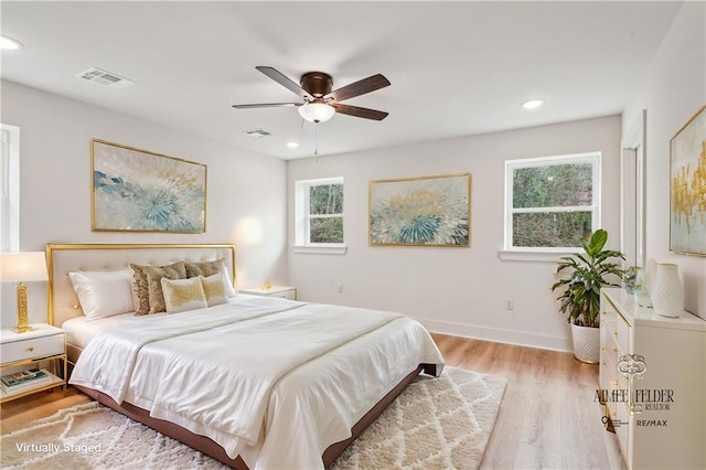 21507 Birtrue Rd, Bush, LA 70431 - bedroom with multiple windows, light wood-style floors, recessed lighting, baseboards, and a ceiling fan