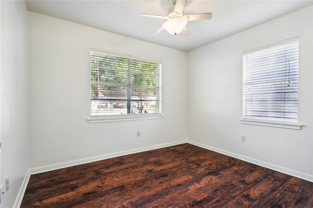 106 Walnut St, Mandeville, LA 70471 - empty room with dark wood-style flooring, baseboards, and ceiling fan