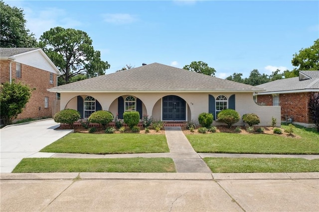 15 Forstall Ave, Kenner, LA 70065 - view of front of home with a front lawn, brick siding, covered porch, and a shingled roof