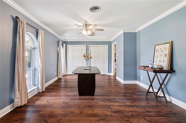 15 Forstall Ave, Kenner, LA 70065 - dining room featuring ceiling fan, dark wood-style floors, ornamental molding, and baseboards