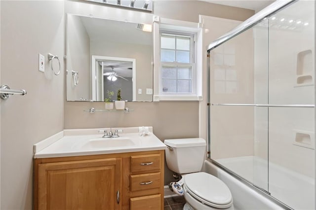 15 Forstall Ave, Kenner, LA 70065 - full bathroom featuring vanity, toilet, bath / shower combo with glass door, and a ceiling fan