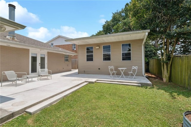 15 Forstall Ave, Kenner, LA 70065 - rear view of property with a patio and french doors