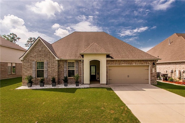 40262 Sedgwick Ln, Ponchatoula, LA 70454 - view of front of property with brick siding, an attached garage, driveway, and roof with shingles
