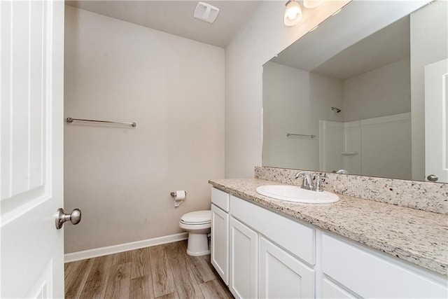 40262 Sedgwick Ln, Ponchatoula, LA 70454 - full bathroom with vanity, wood finished floors, and a shower