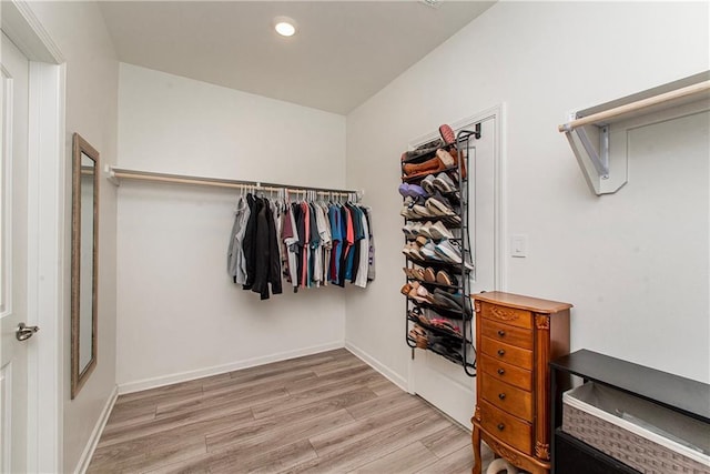 40262 Sedgwick Ln, Ponchatoula, LA 70454 - walk in closet with light wood finished floors