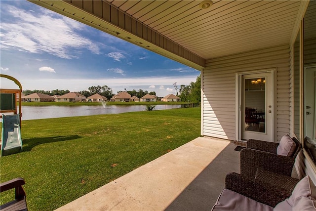 40262 Sedgwick Ln, Ponchatoula, LA 70454 - view of grassy yard featuring a water view, a residential view, and a patio