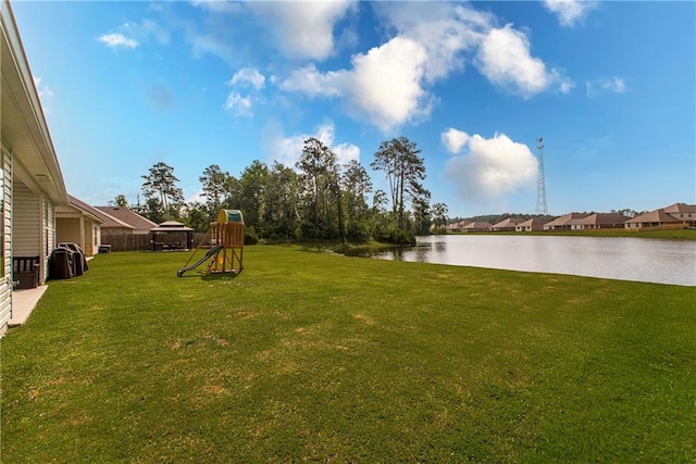 40262 Sedgwick Ln, Ponchatoula, LA 70454 - view of grassy yard with a playground and a water view