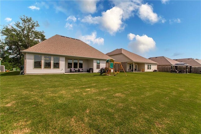 40262 Sedgwick Ln, Ponchatoula, LA 70454 - back of property featuring a playground, a yard, and a gazebo