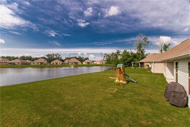 40262 Sedgwick Ln, Ponchatoula, LA 70454 - view of grassy yard featuring a water view, a residential view, and a playground