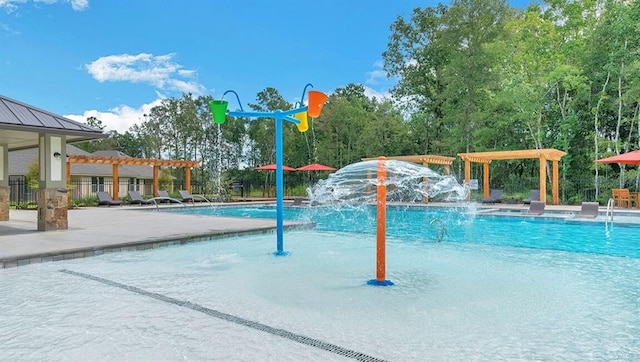40262 Sedgwick Ln, Ponchatoula, LA 70454 - community pool featuring a water play area, a pergola, and a patio area