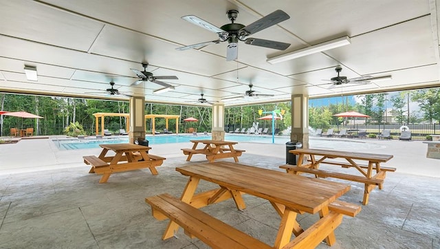 40262 Sedgwick Ln, Ponchatoula, LA 70454 - view of patio / terrace with a ceiling fan and a community pool