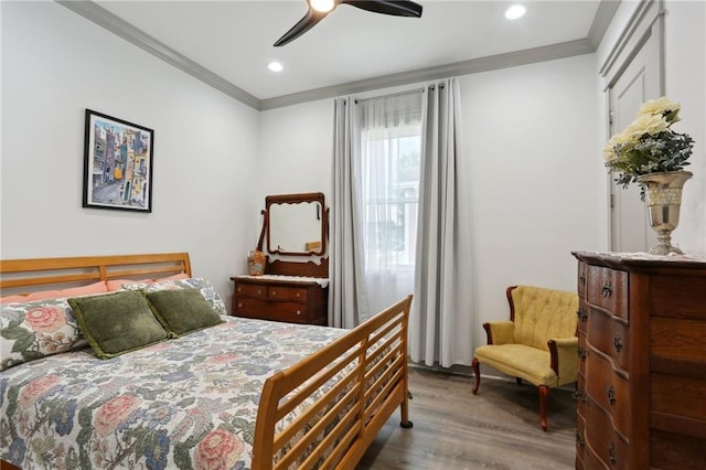 1908 Alexander Ave, Arabi, LA 70032 - bedroom with ornamental molding, wood finished floors, recessed lighting, and ceiling fan