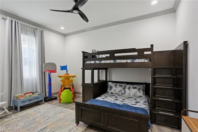 1908 Alexander Ave, Arabi, LA 70032 - bedroom with ornamental molding, wood finished floors, a ceiling fan, recessed lighting, and baseboards