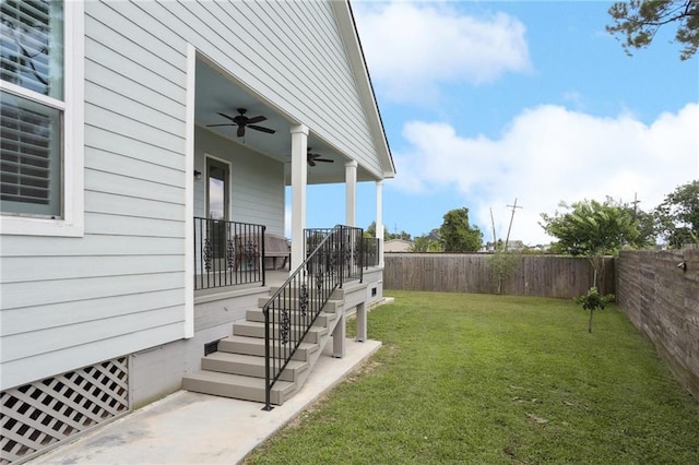 1908 Alexander Ave, Arabi, LA 70032 - view of yard with ceiling fan and stairs