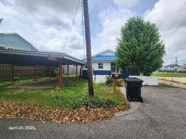 146 Elodie Ave, Harahan, LA 70123 - view of property exterior featuring a carport