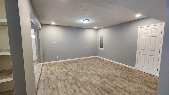 146 Elodie Ave, Harahan, LA 70123 - basement featuring wood finished floors, recessed lighting, baseboards, and electric panel