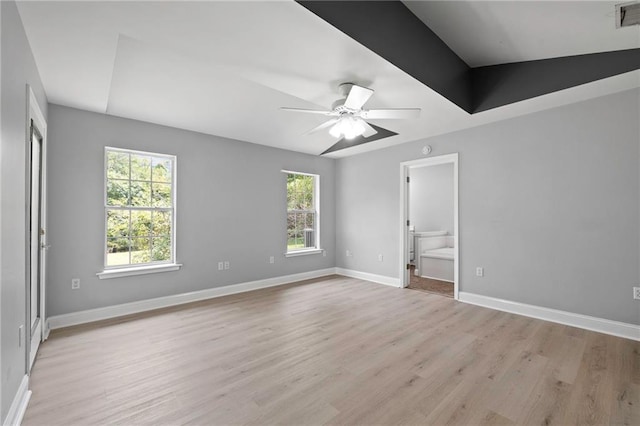 39311 Okefenokee Rd, Pearl River, LA 70452 - unfurnished bedroom with light wood-type flooring, baseboards, connected bathroom, and a ceiling fan