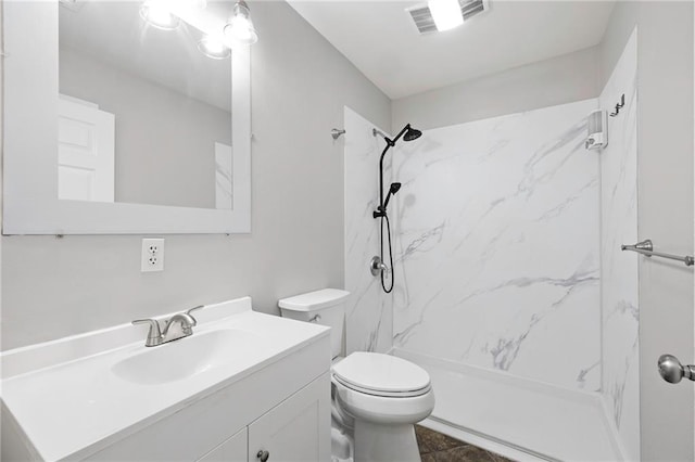 39311 Okefenokee Rd, Pearl River, LA 70452 - full bathroom featuring vanity, toilet, and a marble finish shower