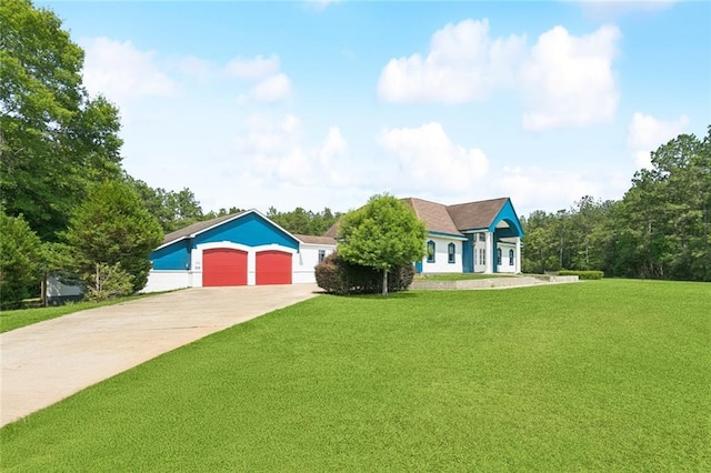 404 Warrior Trce, Covington, LA 70435 - view of front facade with a front lawn and concrete driveway