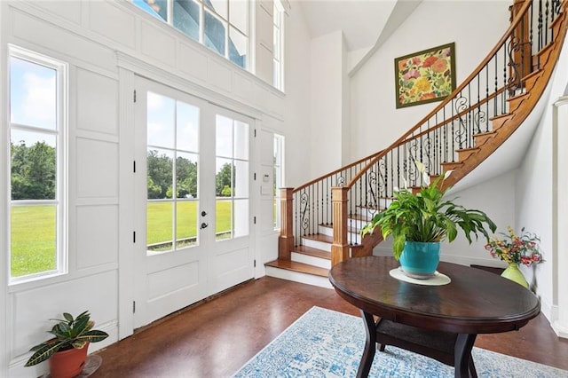 404 Warrior Trce, Covington, LA 70435 - foyer featuring a high ceiling, stairs, french doors, and plenty of natural light