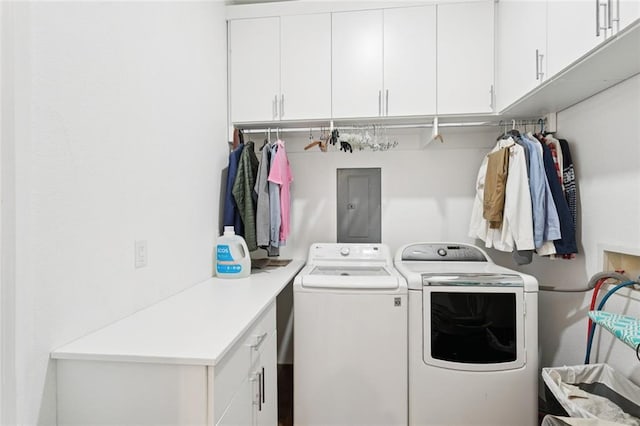 404 Warrior Trce, Covington, LA 70435 - laundry area featuring washer and dryer, electric panel, and cabinet space