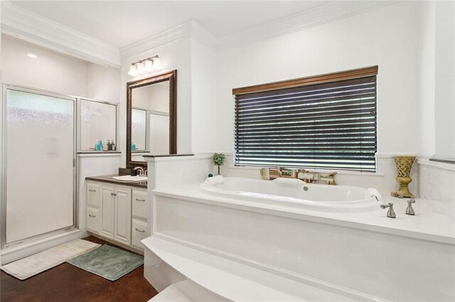 404 Warrior Trce, Covington, LA 70435 - bathroom with a stall shower, a garden tub, vanity, finished concrete floors, and crown molding