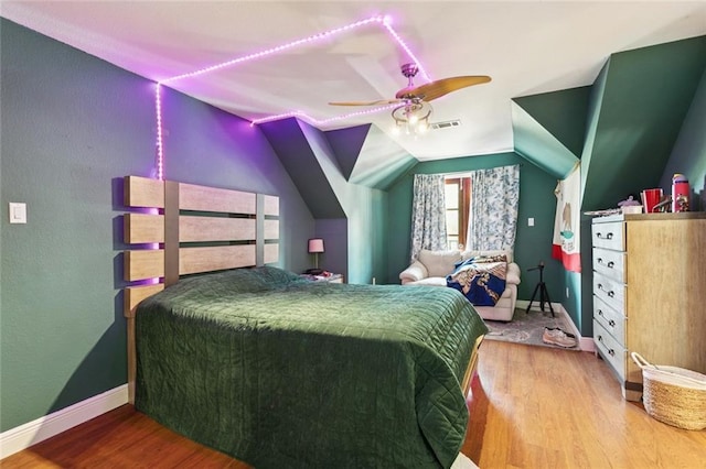 404 Warrior Trce, Covington, LA 70435 - bedroom with wood finished floors, baseboards, vaulted ceiling, and ceiling fan