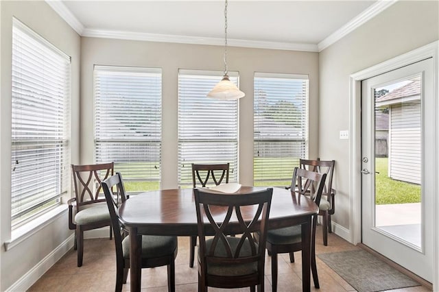 481 Scotch Pine Dr, Ponchatoula, LA 70454 - dining space with baseboards, crown molding, and light tile patterned flooring