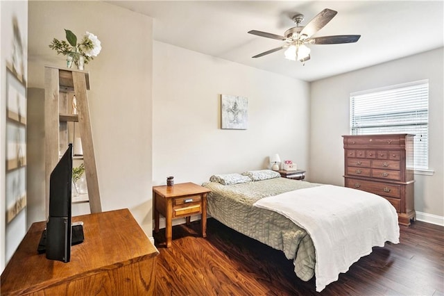 481 Scotch Pine Dr, Ponchatoula, LA 70454 - bedroom with dark wood-style flooring, baseboards, and a ceiling fan