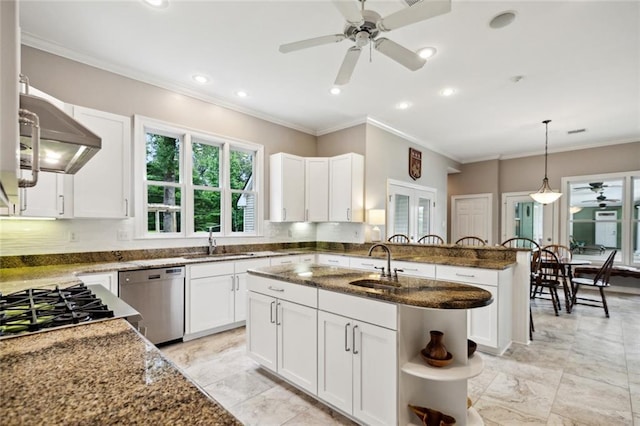 42532 S Range Rd, Hammond, LA 70403 - kitchen with stainless steel dishwasher, a ceiling fan, a sink, dark stone counters, and ornamental molding