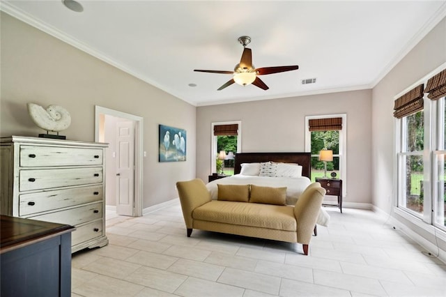 42532 S Range Rd, Hammond, LA 70403 - bedroom with crown molding, baseboards, ceiling fan, and light tile patterned floors